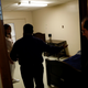US first lady Melania Trump visits a room as Health and Human Services Secretary Alex Azar (R) looks on during a tour of the Lutheran Social Services of the South “Upbring New Hope Children’s Center” near the U.S.-Mexico border in McAllen, Texas.